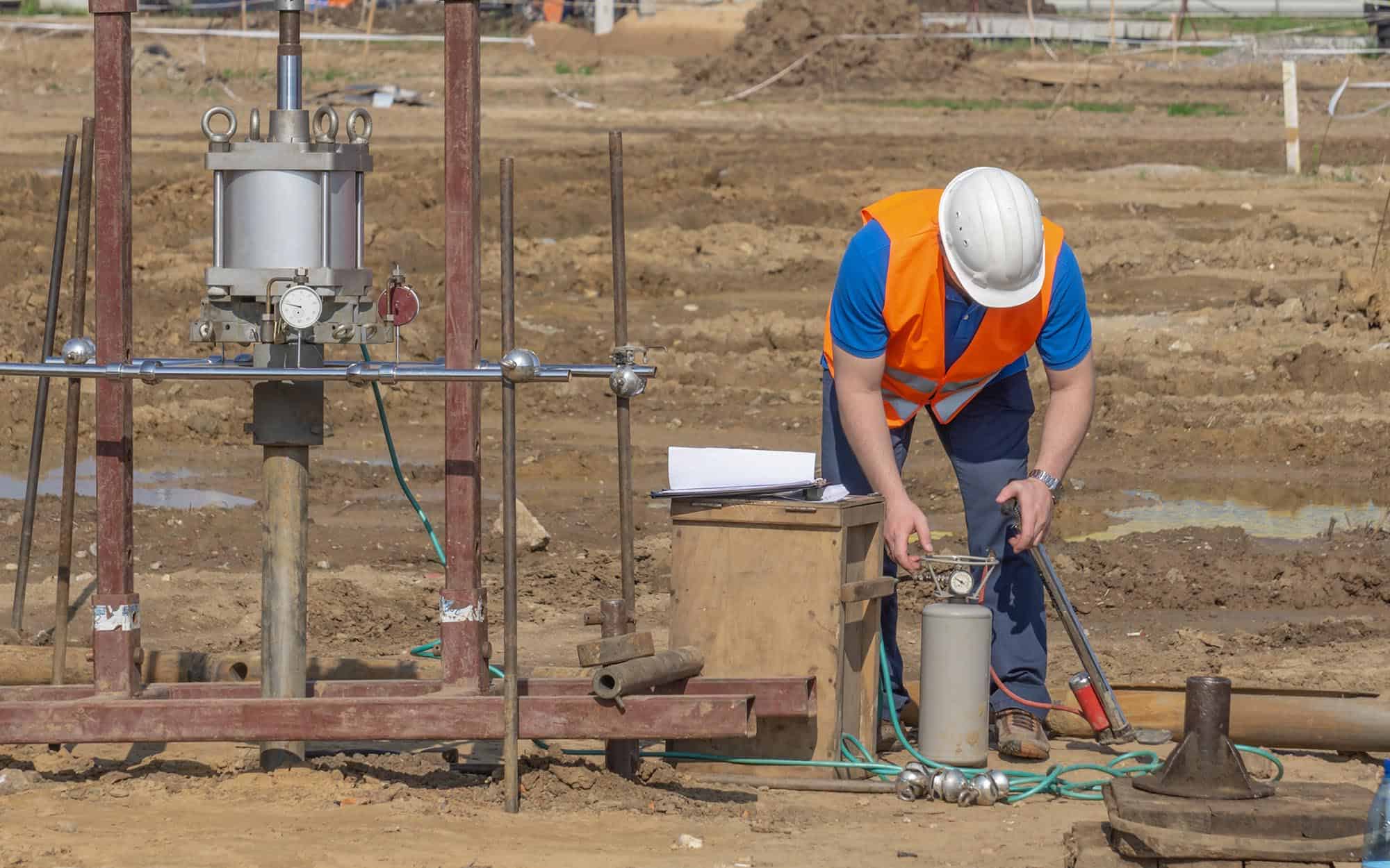 Image-of-a-worker-testing-the-soil